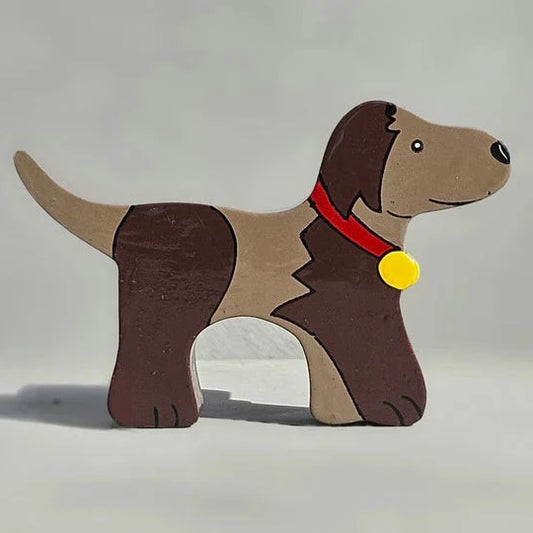 A Magnetic Wooden Dog Play Figure with a yellow collar.