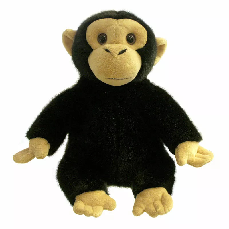 A black Puppet Company Full-bodied Hand Puppet Chimp sitting on a white background.