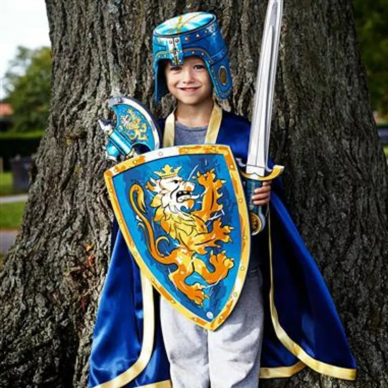 A boy dressed in the Liontouch Noble Knight Full Costume Set, holding a sword.