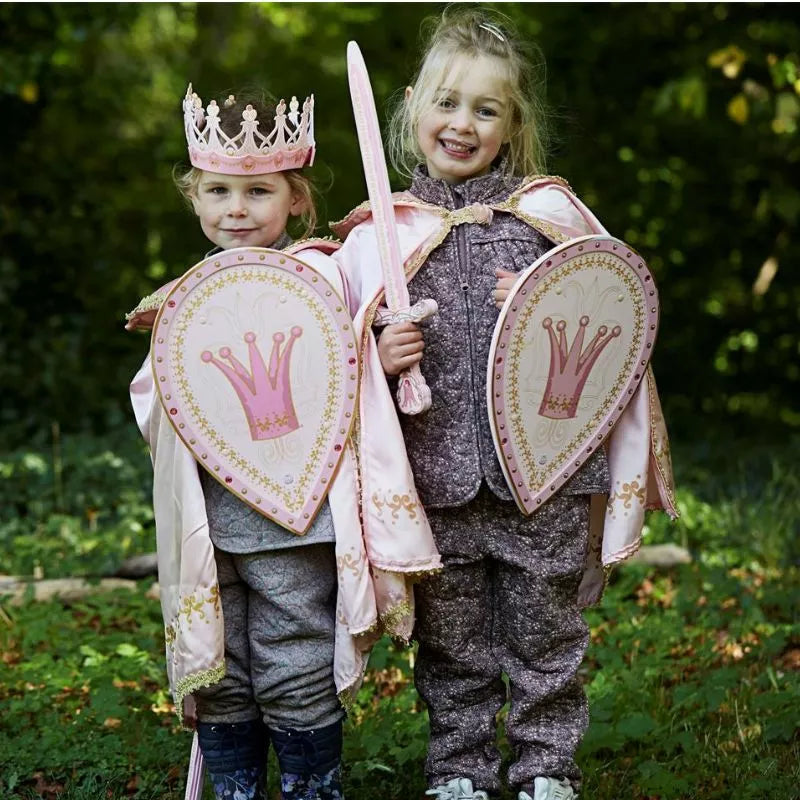 Two little girls perform a puppet show dressed up as Liontouch Queen Rosa Swords.
