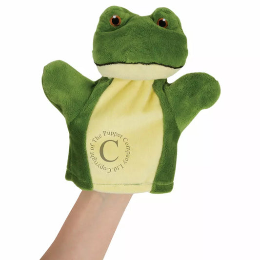 A hand holding The Puppet Company My First Puppet Frog, perfect for kids' puppet shows.