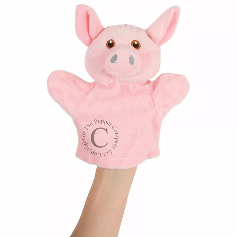 A pink hand puppet perfect for kids in The Puppet Company My First Puppet Pig series with the letter c on it.